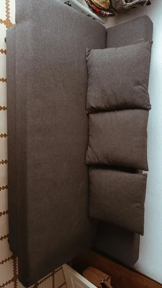 Sofá cama con baúl gris