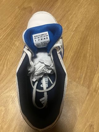 Zapatillas deportivas Adidas blancas y azules