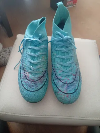 Botas multitacos fútbol turquesa