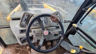 DES02 FERMEC 860 Despiece retro excavadora