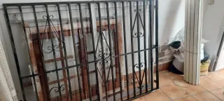 Ventanal aluminio con rejas y persianas