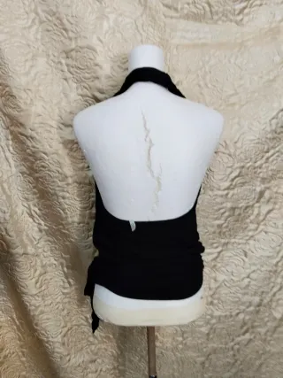 Top nero a fascia con nodo