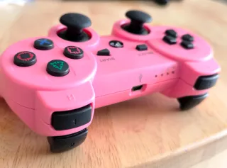 Mando PS3 rosa chicle inalámbrico