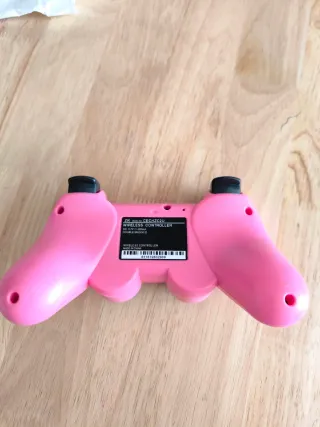 Mando PS3 rosa chicle inalámbrico