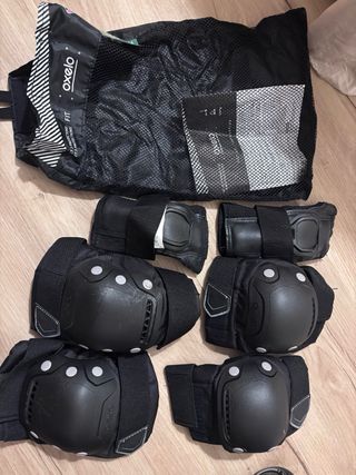 Patines +bolsa+rodilleras Oxelo negros y rosas