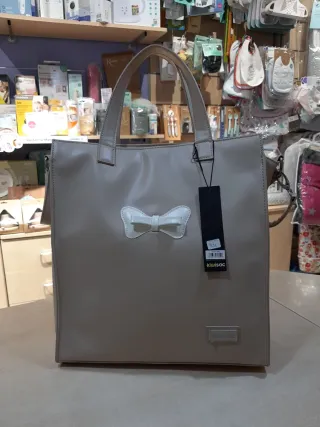 Bolso cambiador Kiwisac beige con lazo