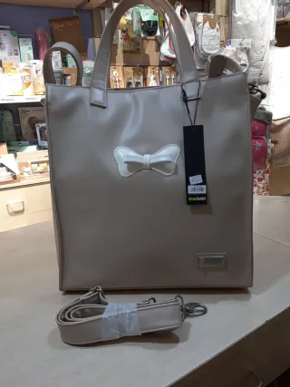 Bolso cambiador Kiwisac beige con lazo