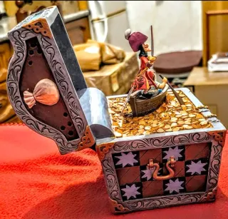 FIGURA DISNEY "COFRE DEL TESORO DE PETER PAN".