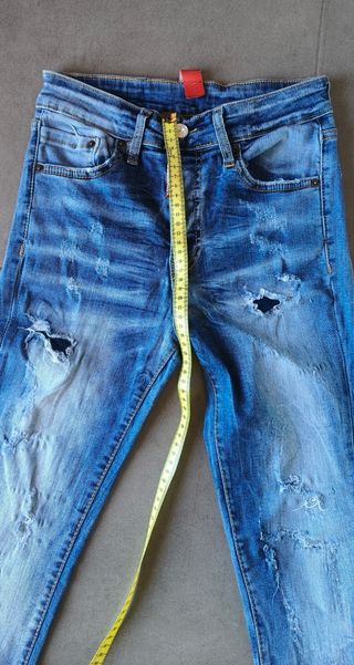 Pantalones vaqueros desgastados azules