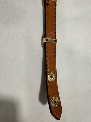 Pulsera negra con logo GG dorado