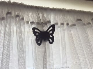Sujetamanteles Mariposa Acero Inox