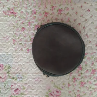 Bolso redondo verde oscuro