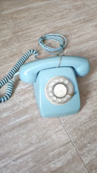 Teléfono Heraldo azul antiguo