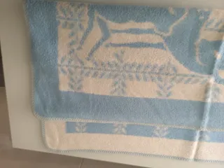 Manta cuna Paduana azul y blanca