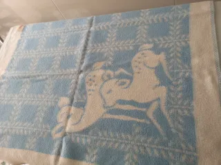 Manta cuna Paduana azul y blanca