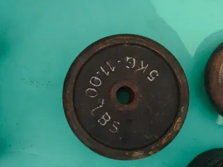 Lote de barra, mancuernas y pesas musculación