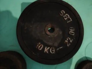 Lote de barra, mancuernas y pesas musculación