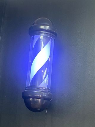 Rulo de barbería con luz LED azul