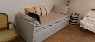 Cama nido tapizada beige con cojines