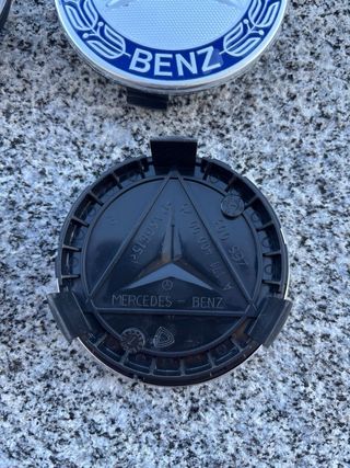 4 Tapabujes Mercedes Benz 75mm azul plata original