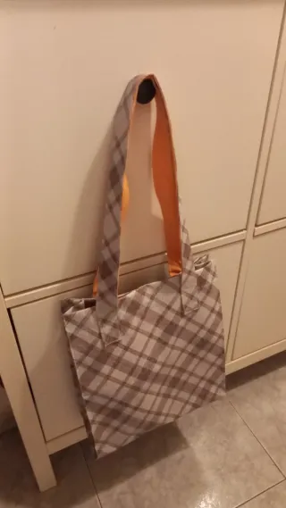 Bolso impermeable de tela a cuadros