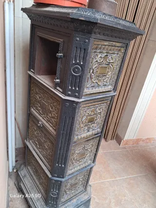 Estufa de leña antigua falta puerta