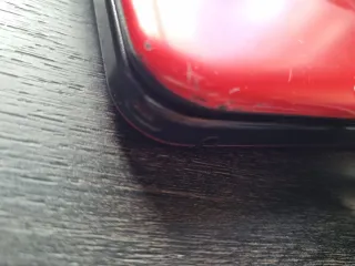 Nintendo 3DS XL Roja con su cargador original.