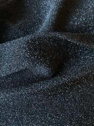 Top fiesta brillante negro