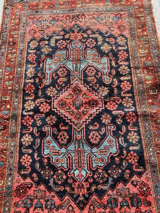 Alfombra antigua de lana