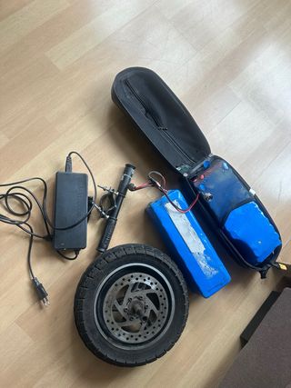 Piezas Patinete Eléctrico: Batería, Rueda y Cargad