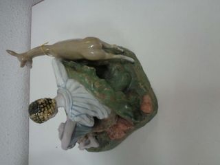 Figura porcelana pareja enamorada y ciervo