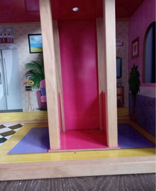 Casa de muñecas de madera