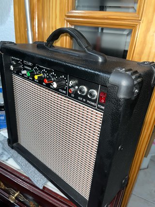 Guitarra y amplificador en perfecto estdo