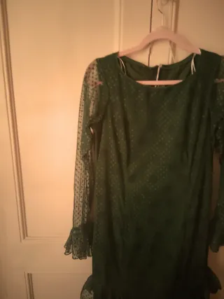 Traje de flamenca verde con volantes