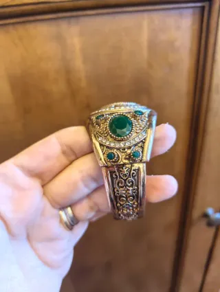 Orologio bracciale vintage dorato con pietre