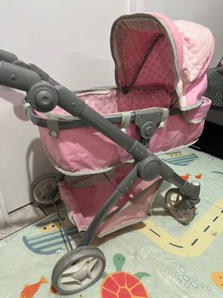 Carro de muñecas rosa