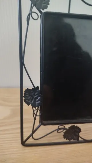 Portafoto in ferro nero con decorazioni