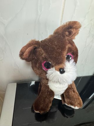 Perrito de peluche ojos grandes