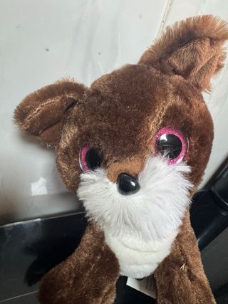 Perrito de peluche ojos grandes