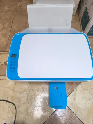 Impresora HP Azul y Blanca