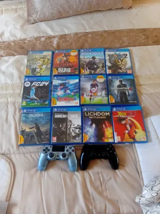 12 juegos+2 mandos todo original  perfecto estado