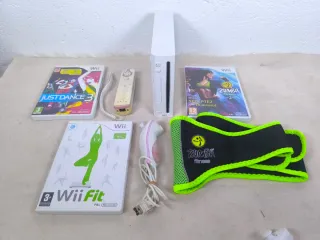 Nintendo Wii + Juegos y Accesorios.