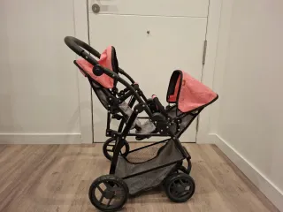 Carrito de juguete gemelar rosa con bolso