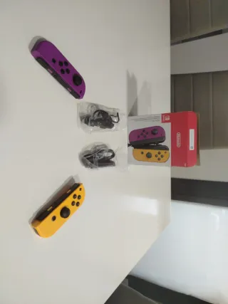 Mandos Nintendo Switch Morado y Naranja