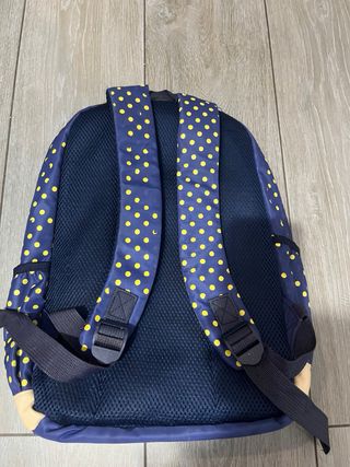 Mochila infantil azul con lunares amarillos