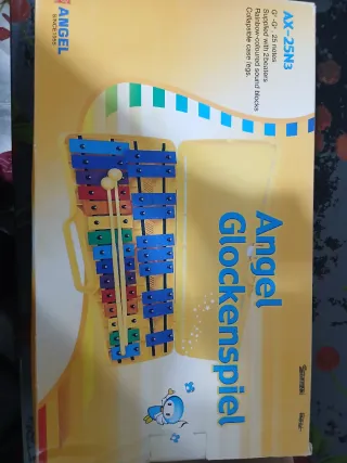 Xilófono amarillo con estuche