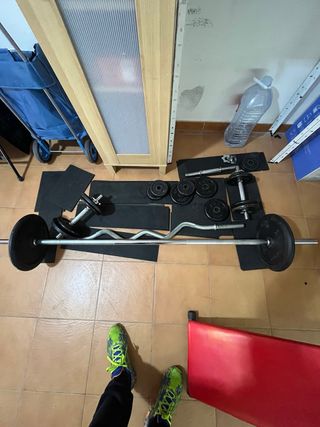 Juego de pesas y barra Algo negociable