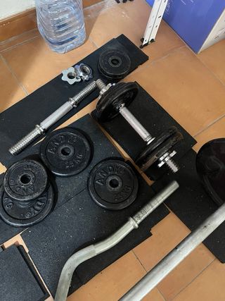 Juego de pesas y barra Algo negociable