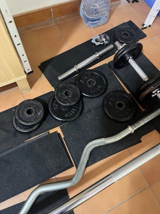 Juego de pesas y barra Algo negociable