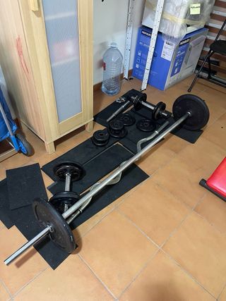 Juego de pesas y barra Algo negociable